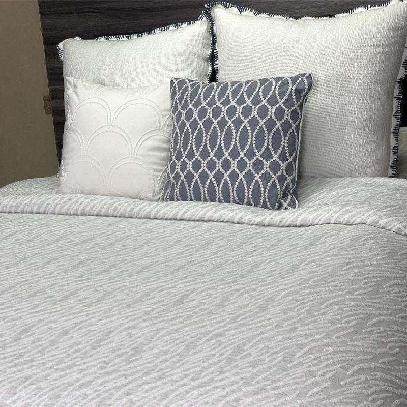 How does the embroidery process of Cotton Embroidered Comforter Set affect product quality?